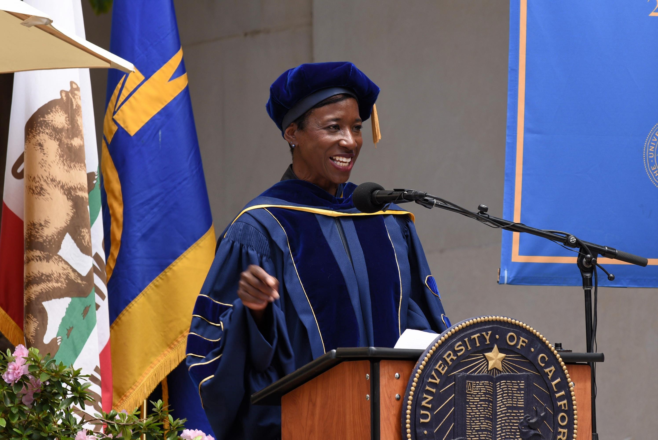 Dean Tracy Johnson speaking at a UCLA commencement ceremony.